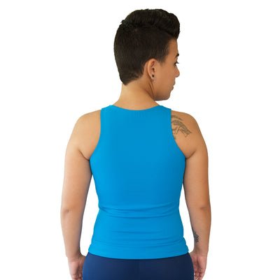 Outplay model wearing an Outplay blue Flatsea, showing off the back few of the full coverage swim top